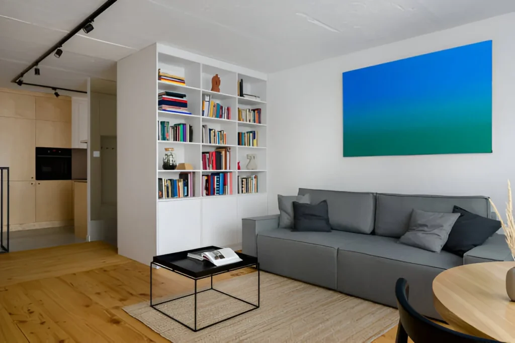 white floor-to-ceiling bookshelves